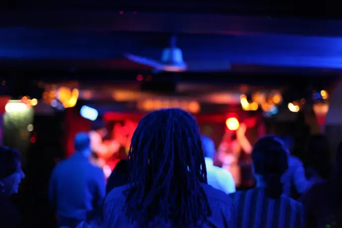 people in a bar with lights